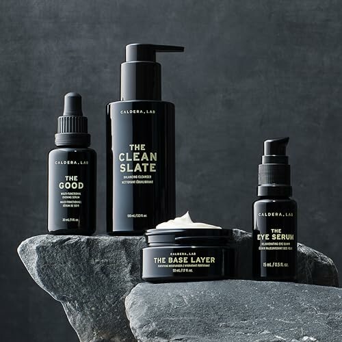 Caldera Lab skincare products displayed on rocks.