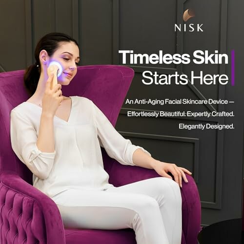 Woman using a facial skincare device on a purple chair.